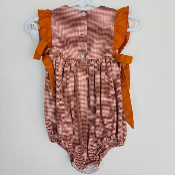 Southern Smocked orange and white gingham checked cheer romper. - Picture 3 of 5